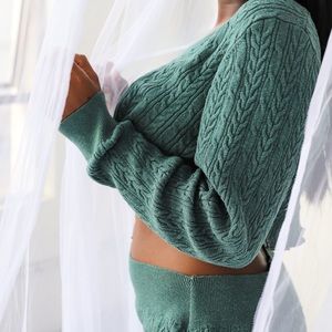 Jade/green two piece skirt set.